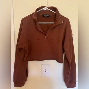 Kittenish cropped half-zipped pullover